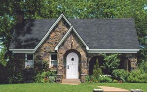 a stone house with a white door