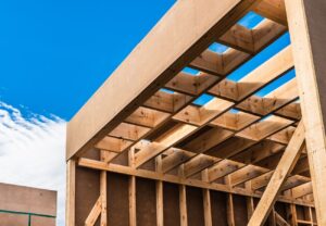 a house under construction with wooden framing