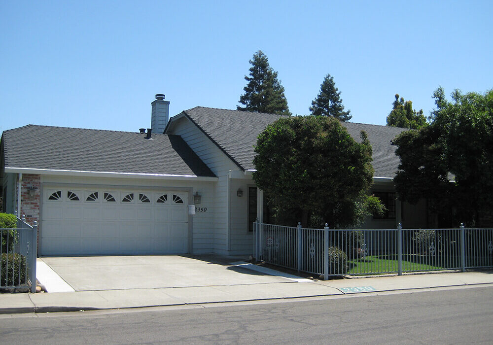 roof on white home