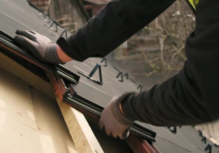 close up of shingles being lade on the roof